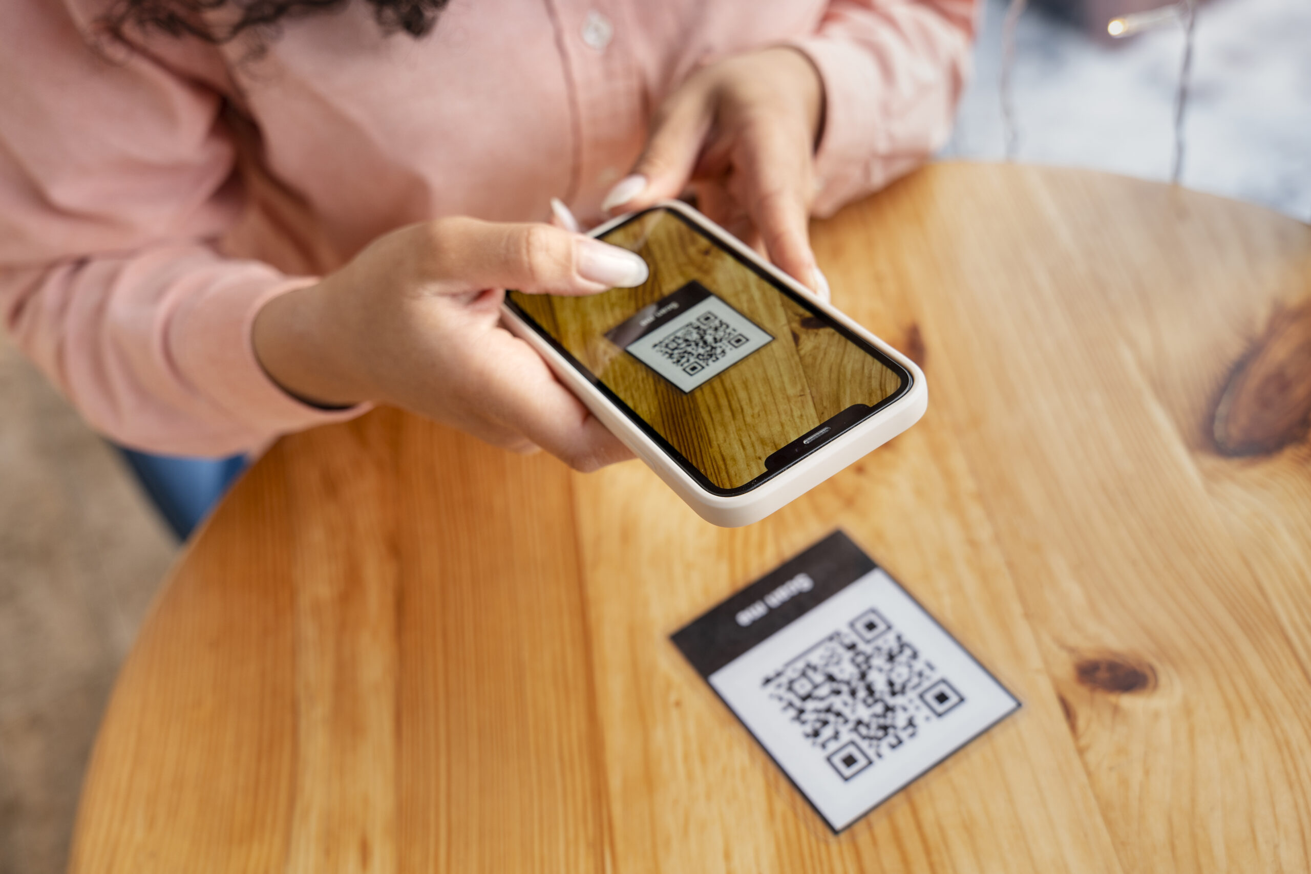 ecommerce gammification, girl scanning QR code